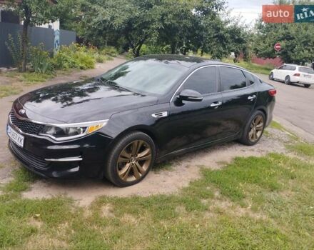 Черный Киа Оптима, объемом двигателя 2.4 л и пробегом 128 тыс. км за 11500 $, фото 1 на Automoto.ua