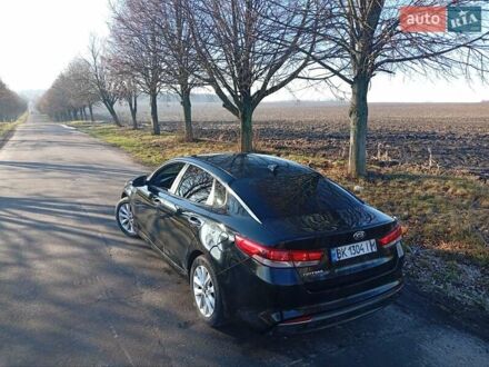 Чорний Кіа Оптіма, об'ємом двигуна 2.36 л та пробігом 262 тис. км за 9600 $, фото 1 на Automoto.ua