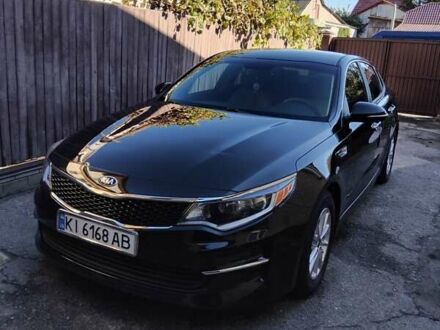Черный Киа Оптима, объемом двигателя 2.4 л и пробегом 113 тыс. км за 11700 $, фото 1 на Automoto.ua