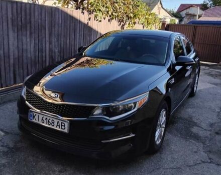 Черный Киа Оптима, объемом двигателя 2.4 л и пробегом 113 тыс. км за 11700 $, фото 1 на Automoto.ua