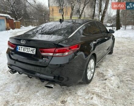 Чорний Кіа Оптіма, об'ємом двигуна 2 л та пробігом 70 тис. км за 19000 $, фото 1 на Automoto.ua