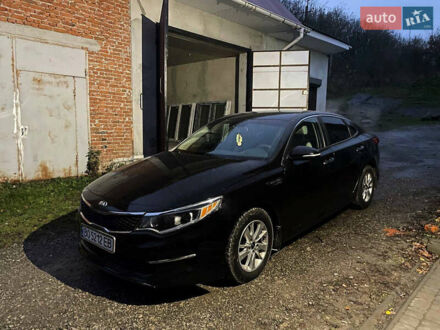 Черный Киа Оптима, объемом двигателя 2.36 л и пробегом 110 тыс. км за 10400 $, фото 1 на Automoto.ua
