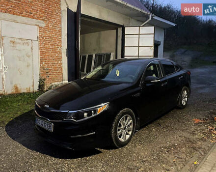 Черный Киа Оптима, объемом двигателя 2.36 л и пробегом 110 тыс. км за 10400 $, фото 1 на Automoto.ua