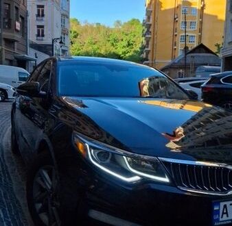 Черный Киа Оптима, объемом двигателя 2.36 л и пробегом 250 тыс. км за 10500 $, фото 1 на Automoto.ua