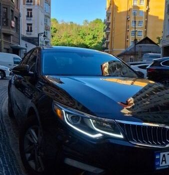 Чорний Кіа Оптіма, об'ємом двигуна 2.36 л та пробігом 250 тис. км за 10500 $, фото 1 на Automoto.ua