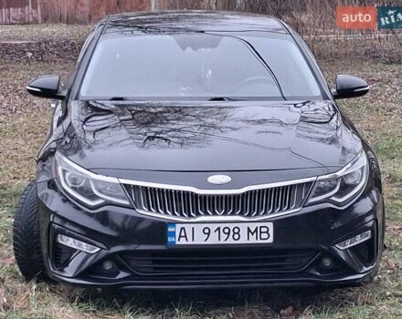 Черный Киа Оптима, объемом двигателя 2.36 л и пробегом 134 тыс. км за 14300 $, фото 1 на Automoto.ua