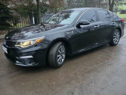 Черный Киа Оптима, объемом двигателя 2.36 л и пробегом 55 тыс. км за 14500 $, фото 1 на Automoto.ua