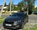 Коричневий Кіа Оптіма, об'ємом двигуна 2 л та пробігом 200 тис. км за 10500 $, фото 1 на Automoto.ua
