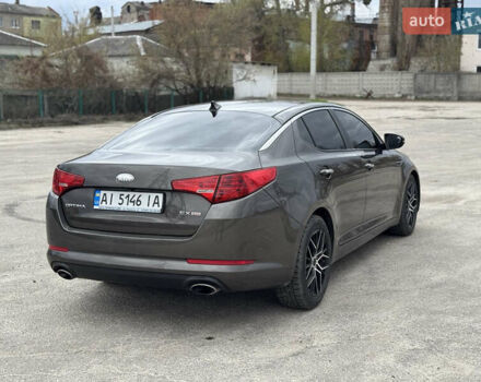 Коричневый Киа Оптима, объемом двигателя 2.4 л и пробегом 248 тыс. км за 8050 $, фото 13 на Automoto.ua