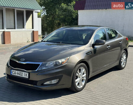 Коричневый Киа Оптима, объемом двигателя 2.4 л и пробегом 181 тыс. км за 9500 $, фото 1 на Automoto.ua