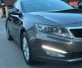 Коричневий Кіа Оптіма, об'ємом двигуна 2 л та пробігом 121 тис. км за 11400 $, фото 1 на Automoto.ua