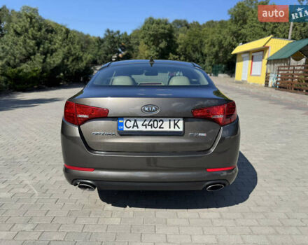 Коричневый Киа Оптима, объемом двигателя 2.4 л и пробегом 181 тыс. км за 9500 $, фото 8 на Automoto.ua