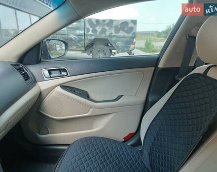 Коричневий Кіа Оптіма, об'ємом двигуна 2.36 л та пробігом 210 тис. км за 11200 $, фото 9 на Automoto.ua