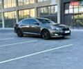 Коричневый Киа Оптима, объемом двигателя 2.36 л и пробегом 225 тыс. км за 9300 $, фото 1 на Automoto.ua