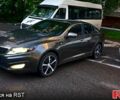 Коричневый Киа Оптима, объемом двигателя 2.4 л и пробегом 250 тыс. км за 9500 $, фото 1 на Automoto.ua