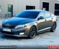 Коричневий Кіа Оптіма, об'ємом двигуна 2.4 л та пробігом 235 тис. км за 9700 $, фото 1 на Automoto.ua