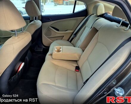 Коричневый Киа Оптима, объемом двигателя 2.4 л и пробегом 145 тыс. км за 8500 $, фото 8 на Automoto.ua