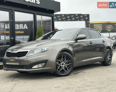 Коричневый Киа Оптима, объемом двигателя 2.36 л и пробегом 220 тыс. км за 8800 $, фото 1 на Automoto.ua