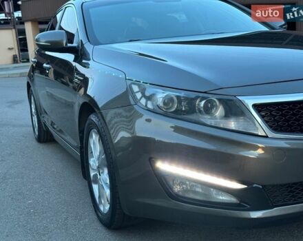 Коричневий Кіа Оптіма, об'ємом двигуна 2 л та пробігом 121 тис. км за 11400 $, фото 1 на Automoto.ua