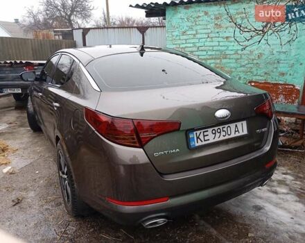 Коричневий Кіа Оптіма, об'ємом двигуна 2.4 л та пробігом 250 тис. км за 7000 $, фото 1 на Automoto.ua