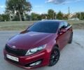 Червоний Кіа Оптіма, об'ємом двигуна 2 л та пробігом 252 тис. км за 8500 $, фото 1 на Automoto.ua