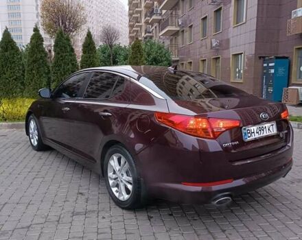 Красный Киа Оптима, объемом двигателя 2.36 л и пробегом 164 тыс. км за 10100 $, фото 7 на Automoto.ua