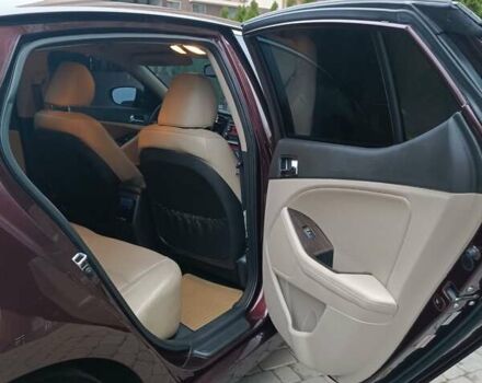 Красный Киа Оптима, объемом двигателя 2.36 л и пробегом 164 тыс. км за 10100 $, фото 14 на Automoto.ua