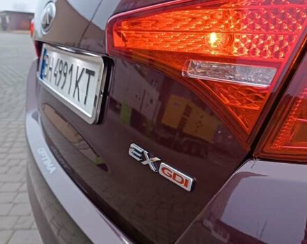 Красный Киа Оптима, объемом двигателя 2.36 л и пробегом 164 тыс. км за 10100 $, фото 5 на Automoto.ua