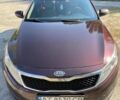 Красный Киа Оптима, объемом двигателя 2.4 л и пробегом 302 тыс. км за 8700 $, фото 1 на Automoto.ua