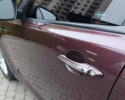 Красный Киа Оптима, объемом двигателя 2.36 л и пробегом 164 тыс. км за 10100 $, фото 9 на Automoto.ua