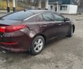 Красный Киа Оптима, объемом двигателя 2.4 л и пробегом 290 тыс. км за 8000 $, фото 2 на Automoto.ua