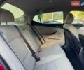 Красный Киа Оптима, объемом двигателя 2.4 л и пробегом 145 тыс. км за 9000 $, фото 12 на Automoto.ua