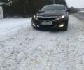 Красный Киа Оптима, объемом двигателя 2.4 л и пробегом 135 тыс. км за 10500 $, фото 1 на Automoto.ua