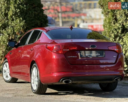 Красный Киа Оптима, объемом двигателя 2.36 л и пробегом 183 тыс. км за 8500 $, фото 36 на Automoto.ua