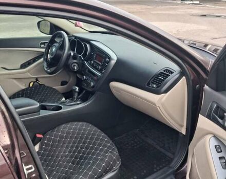 Красный Киа Оптима, объемом двигателя 2.4 л и пробегом 290 тыс. км за 8000 $, фото 6 на Automoto.ua