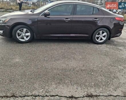 Красный Киа Оптима, объемом двигателя 2.4 л и пробегом 290 тыс. км за 8000 $, фото 1 на Automoto.ua