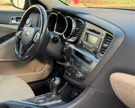 Красный Киа Оптима, объемом двигателя 2.4 л и пробегом 145 тыс. км за 9000 $, фото 9 на Automoto.ua