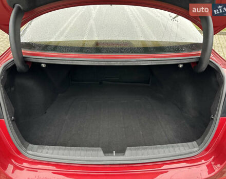 Красный Киа Оптима, объемом двигателя 2.36 л и пробегом 189 тыс. км за 8850 $, фото 5 на Automoto.ua