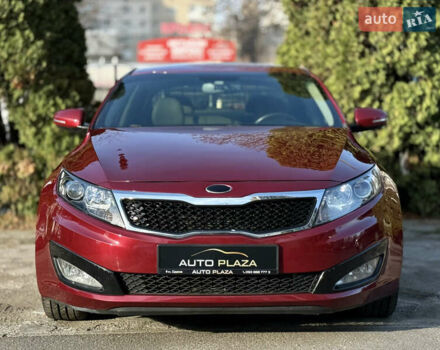 Красный Киа Оптима, объемом двигателя 2.36 л и пробегом 183 тыс. км за 8500 $, фото 2 на Automoto.ua