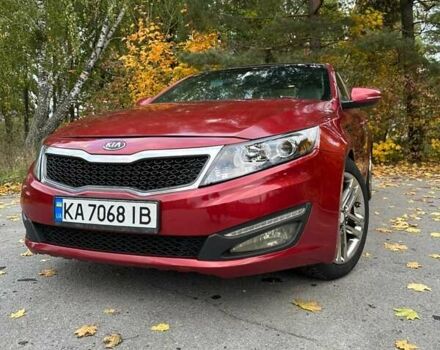 Красный Киа Оптима, объемом двигателя 2 л и пробегом 195 тыс. км за 9700 $, фото 2 на Automoto.ua