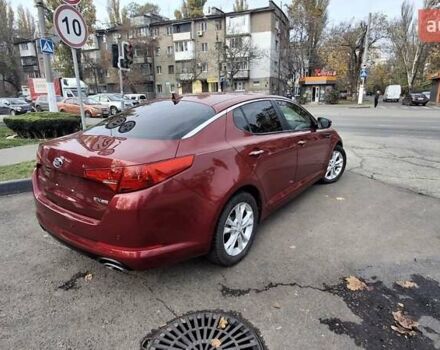 Червоний Кіа Оптіма, об'ємом двигуна 2.36 л та пробігом 145 тис. км за 9200 $, фото 2 на Automoto.ua