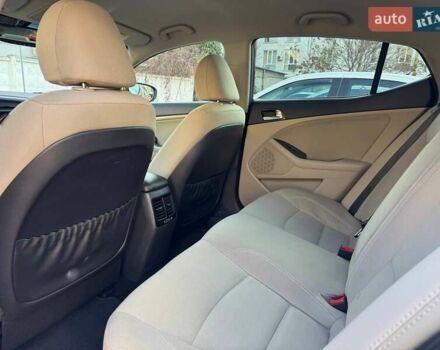 Красный Киа Оптима, объемом двигателя 2.4 л и пробегом 145 тыс. км за 9000 $, фото 11 на Automoto.ua