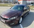 Красный Киа Оптима, объемом двигателя 2.4 л и пробегом 120 тыс. км за 8200 $, фото 1 на Automoto.ua