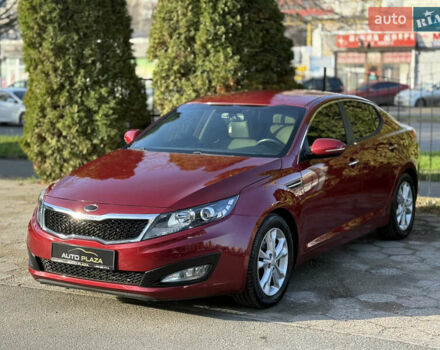Красный Киа Оптима, объемом двигателя 2.36 л и пробегом 183 тыс. км за 8500 $, фото 4 на Automoto.ua