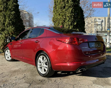 Красный Киа Оптима, объемом двигателя 2.36 л и пробегом 183 тыс. км за 8500 $, фото 30 на Automoto.ua