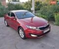 Червоний Кіа Оптіма, об'ємом двигуна 2.36 л та пробігом 98 тис. км за 8900 $, фото 1 на Automoto.ua