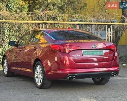 Красный Киа Оптима, объемом двигателя 2.4 л и пробегом 145 тыс. км за 9000 $, фото 5 на Automoto.ua