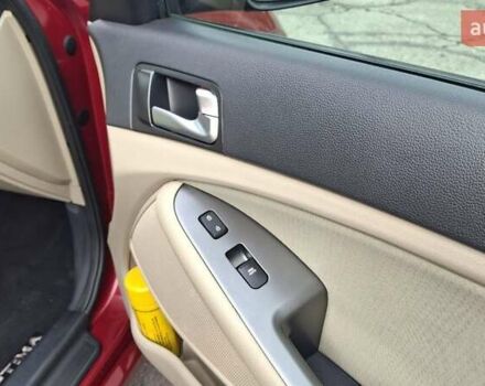 Червоний Кіа Оптіма, об'ємом двигуна 2.36 л та пробігом 145 тис. км за 9200 $, фото 12 на Automoto.ua