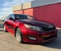 Красный Киа Оптима, объемом двигателя 2.4 л и пробегом 83 тыс. км за 5000 $, фото 2 на Automoto.ua