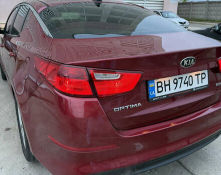 Красный Киа Оптима, объемом двигателя 2.4 л и пробегом 136 тыс. км за 9800 $, фото 18 на Automoto.ua